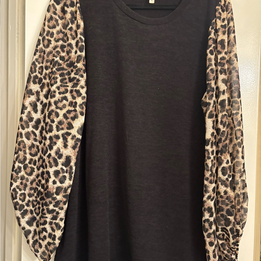 Stylish Black Sweater with Leopard Print Sleeves